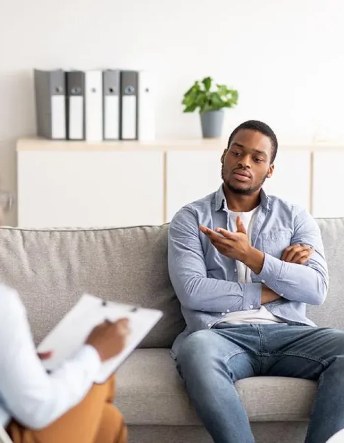 burned-out-man-talks-to-someone-about-his-stress